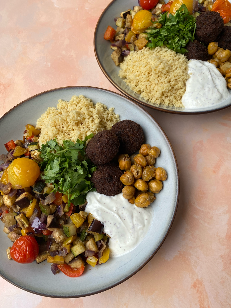 Roasted Vegetable & Falafel Salad - A colourful, hearty salad layering spiced chickpeas, roasted vegetables, fluffy couscous, crispy falafel, and zesty yoghurt. Packed with plant-based protein and big flavours.